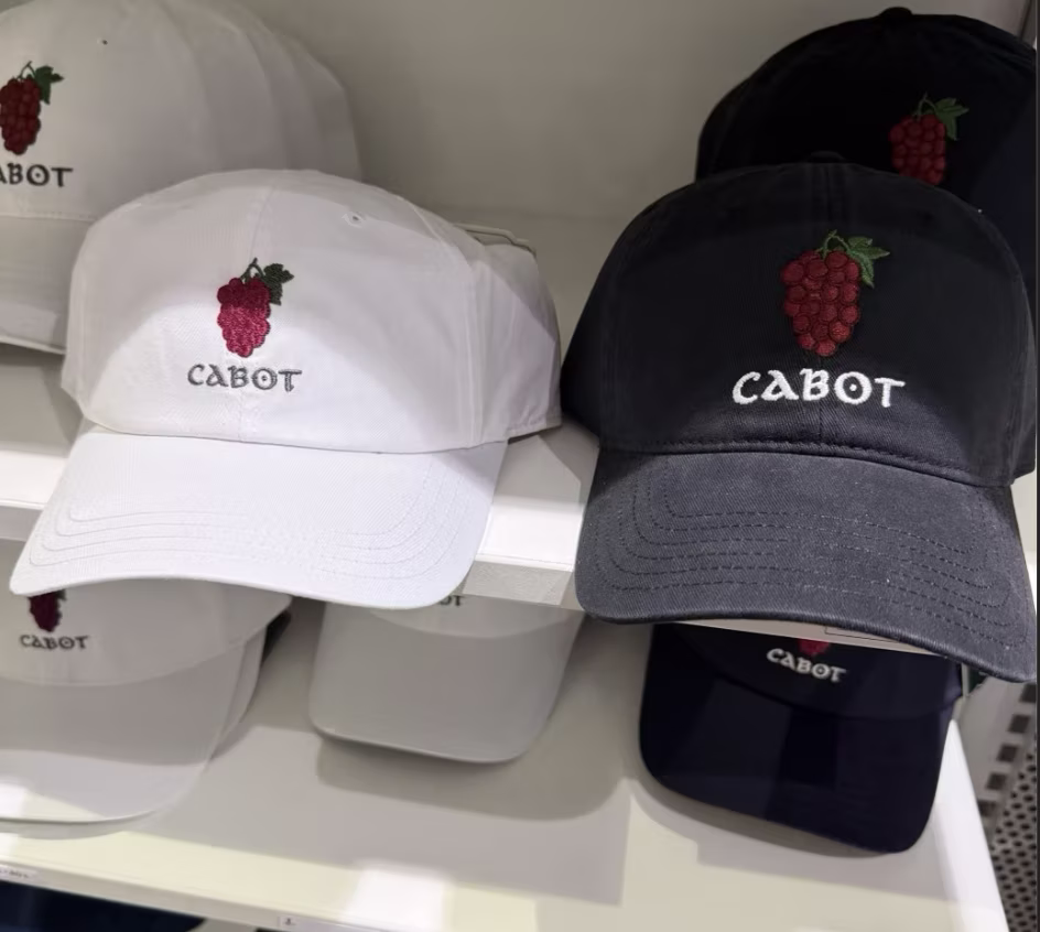 Hat showing inconsistent embroidery size compared to other pieces in the shop